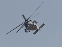 A Chinese Navy ship-borne helicopter Z-20 performs a flight demonstration at the Zhuhai Air Show in Zhuhai, Guangdong province, China, on No...