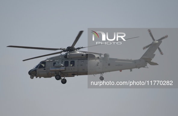 A Chinese Navy ship-borne helicopter Z-20 performs a flight demonstration at the Zhuhai Air Show in Zhuhai, Guangdong province, China, on No...