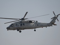 A Chinese Navy ship-borne helicopter Z-20 performs a flight demonstration at the Zhuhai Air Show in Zhuhai, Guangdong province, China, on No...