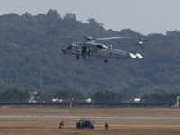 A Chinese Navy ship-borne helicopter Z-20 performs a flight demonstration at the Zhuhai Air Show in Zhuhai, Guangdong province, China, on No...