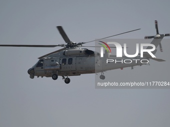 A Chinese Navy ship-borne helicopter Z-20 performs a flight demonstration at the Zhuhai Air Show in Zhuhai, Guangdong province, China, on No...