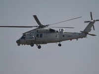 A Chinese Navy ship-borne helicopter Z-20 performs a flight demonstration at the Zhuhai Air Show in Zhuhai, Guangdong province, China, on No...