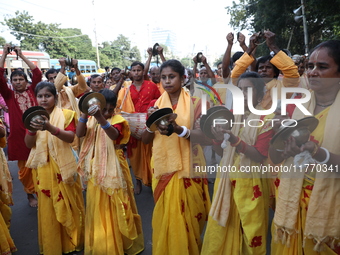 People participate in a protest rally against the attacks on Hindu minorities in neighboring Bangladesh, currently under the rule of an inte...