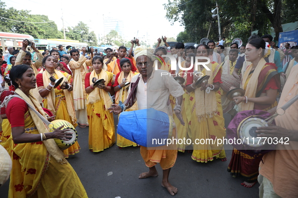 People participate in a protest rally against the attacks on Hindu minorities in neighboring Bangladesh, currently under the rule of an inte...