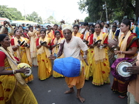 People participate in a protest rally against the attacks on Hindu minorities in neighboring Bangladesh, currently under the rule of an inte...