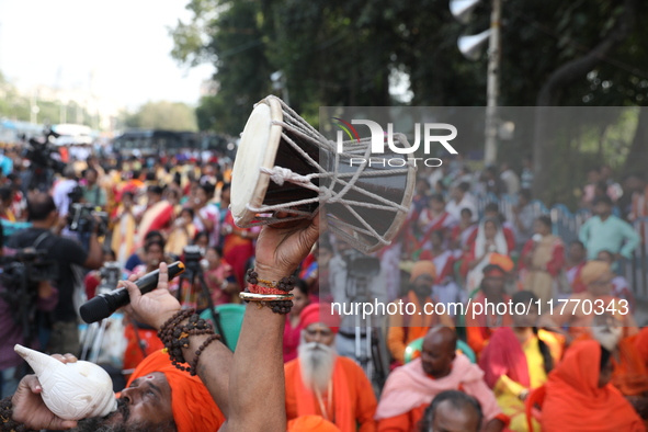 People participate in a protest rally against the attacks on Hindu minorities in neighboring Bangladesh, currently under the rule of an inte...