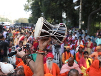 People participate in a protest rally against the attacks on Hindu minorities in neighboring Bangladesh, currently under the rule of an inte...