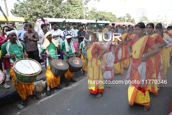 People participate in a protest rally against the attacks on Hindu minorities in neighboring Bangladesh, currently under the rule of an inte...