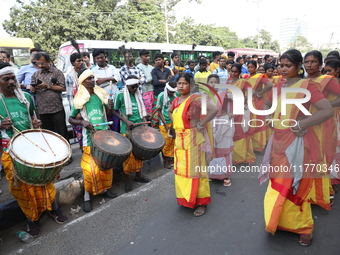 People participate in a protest rally against the attacks on Hindu minorities in neighboring Bangladesh, currently under the rule of an inte...