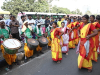 People participate in a protest rally against the attacks on Hindu minorities in neighboring Bangladesh, currently under the rule of an inte...