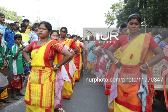 People participate in a protest rally against the attacks on Hindu minorities in neighboring Bangladesh, currently under the rule of an inte...