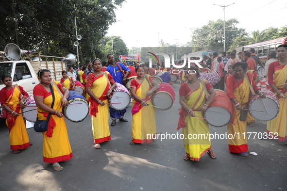 People participate in a protest rally against the attacks on Hindu minorities in neighboring Bangladesh, currently under the rule of an inte...