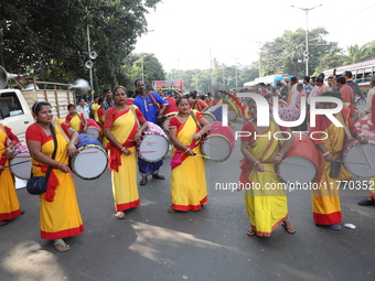 People participate in a protest rally against the attacks on Hindu minorities in neighboring Bangladesh, currently under the rule of an inte...