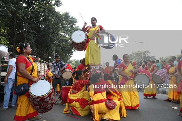 People participate in a protest rally against the attacks on Hindu minorities in neighboring Bangladesh, currently under the rule of an inte...