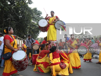 People participate in a protest rally against the attacks on Hindu minorities in neighboring Bangladesh, currently under the rule of an inte...