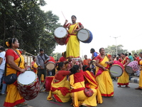 People participate in a protest rally against the attacks on Hindu minorities in neighboring Bangladesh, currently under the rule of an inte...