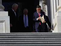 House Majority Whip Tom Emmer (R-MN), Leader Steve Scalise (R-LA) and House Speaker Mike Johnson (R-LA) walk to a press conference on the st...