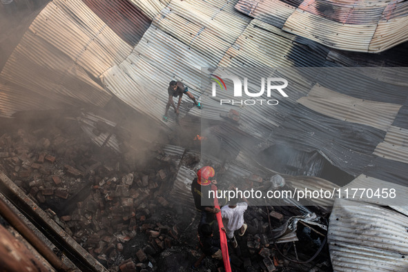 A local shoe factory is gutted due to a fire incident in Dhaka, Bangladesh, on November 12, 2024. 