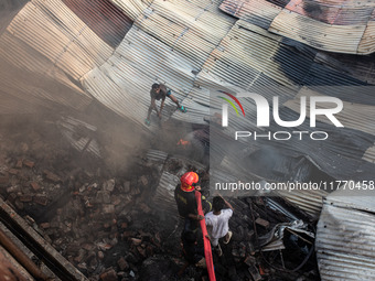 A local shoe factory is gutted due to a fire incident in Dhaka, Bangladesh, on November 12, 2024. (