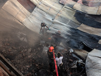 A local shoe factory is gutted due to a fire incident in Dhaka, Bangladesh, on November 12, 2024. (