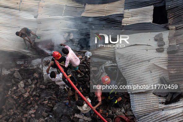 A local shoe factory is gutted due to a fire incident in Dhaka, Bangladesh, on November 12, 2024. 