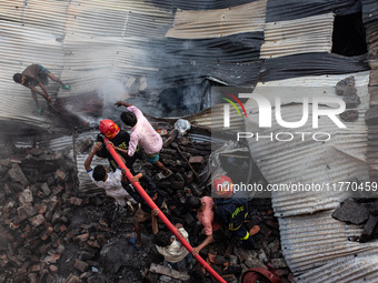 A local shoe factory is gutted due to a fire incident in Dhaka, Bangladesh, on November 12, 2024. (