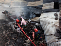 A local shoe factory is gutted due to a fire incident in Dhaka, Bangladesh, on November 12, 2024. (