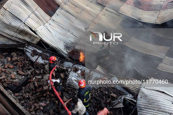 A local shoe factory is gutted due to a fire incident in Dhaka, Bangladesh, on November 12, 2024. 