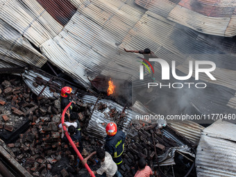 A local shoe factory is gutted due to a fire incident in Dhaka, Bangladesh, on November 12, 2024. (