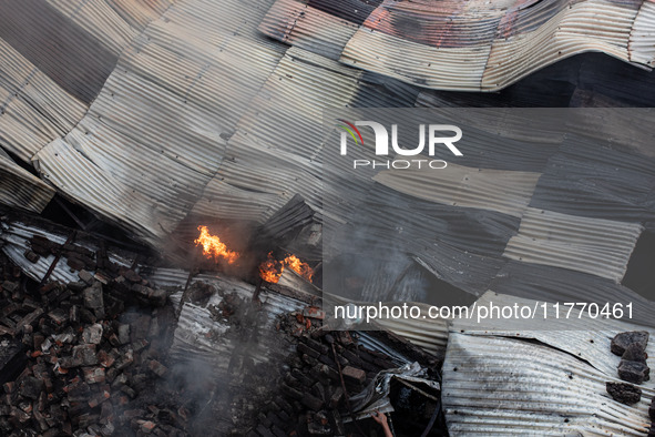 A local shoe factory is gutted due to a fire incident in Dhaka, Bangladesh, on November 12, 2024. 