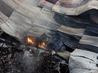 A local shoe factory is gutted due to a fire incident in Dhaka, Bangladesh, on November 12, 2024. (