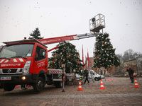 Workers are erecting a Christmas Tree at the Podgorski Square in Krakow, Poland on November 12th, 2024. (