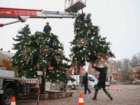 Workers are erecting a Christmas Tree at the Podgorski Square in Krakow, Poland on November 12th, 2024. (