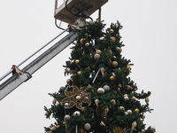 Workers are erecting a Christmas Tree at the Podgorski Square in Krakow, Poland on November 12th, 2024. (