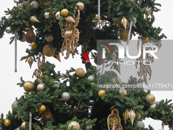 Workers are erecting a Christmas Tree at the Podgorski Square in Krakow, Poland on November 12th, 2024. (