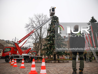 Workers are erecting a Christmas Tree at the Podgorski Square in Krakow, Poland on November 12th, 2024. (