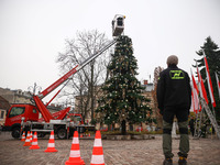 Workers are erecting a Christmas Tree at the Podgorski Square in Krakow, Poland on November 12th, 2024. (