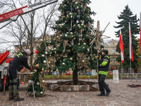 Workers are erecting a Christmas Tree at the Podgorski Square in Krakow, Poland on November 12th, 2024. (