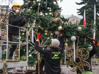 Workers are erecting a Christmas Tree at the Podgorski Square in Krakow, Poland on November 12th, 2024. (