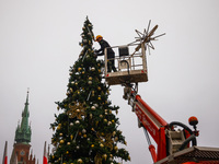 Workers are erecting a Christmas Tree at the Podgorski Square in Krakow, Poland on November 12th, 2024. (