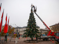 Workers are erecting a Christmas Tree at the Podgorski Square in Krakow, Poland on November 12th, 2024. (