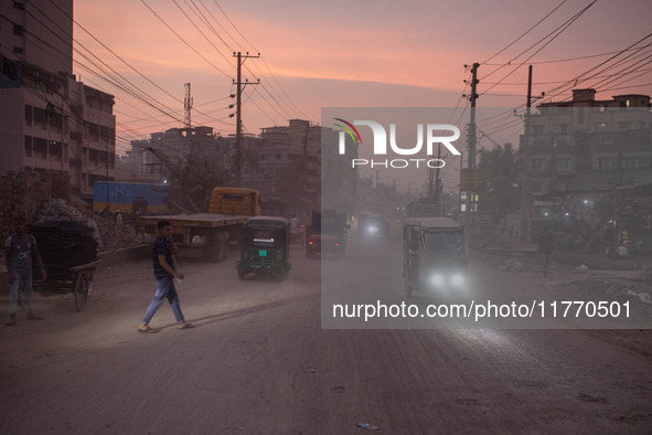 People suffer on the street due to massive dust in the air in the Shyampur area, in Dhaka, Bangladesh, on November 12, 2024. Dhaka, the over...