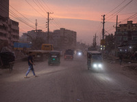 People suffer on the street due to massive dust in the air in the Shyampur area, in Dhaka, Bangladesh, on November 12, 2024. Dhaka, the over...