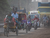 People suffer on the street due to massive dust in the air in the Shyampur area, in Dhaka, Bangladesh, on November 12, 2024. Dhaka, the over...