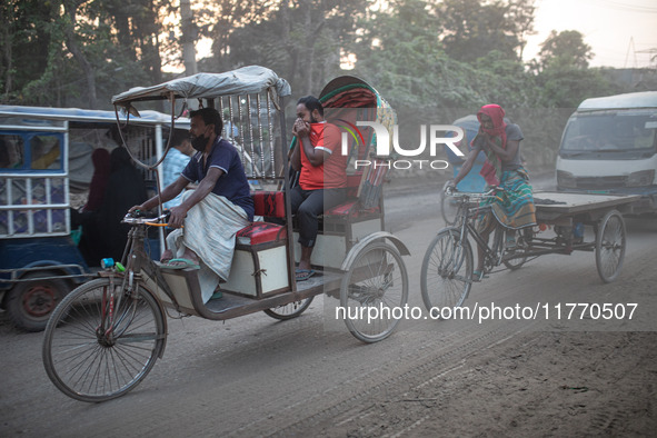 People suffer on the street due to massive dust in the air in the Shyampur area, in Dhaka, Bangladesh, on November 12, 2024. Dhaka, the over...