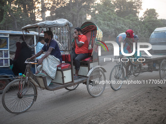 People suffer on the street due to massive dust in the air in the Shyampur area, in Dhaka, Bangladesh, on November 12, 2024. Dhaka, the over...