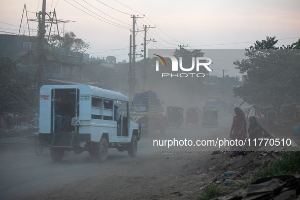 People suffer on the street due to massive dust in the air in the Shyampur area, in Dhaka, Bangladesh, on November 12, 2024. Dhaka, the over...