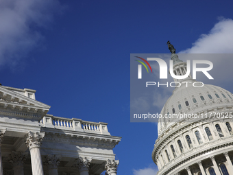 A law enforcement officer watches from the rooftop of the U.S. Capitol in Washington, D.C. on November 12, 2024, prior to a GOP press confer...