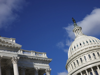 A law enforcement officer watches from the rooftop of the U.S. Capitol in Washington, D.C. on November 12, 2024, prior to a GOP press confer...