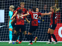 In Vancouver, Canada, on December 5, 2023, Quinn #5 and other Canadian players celebrate a goal during the International Friendly Match betw...